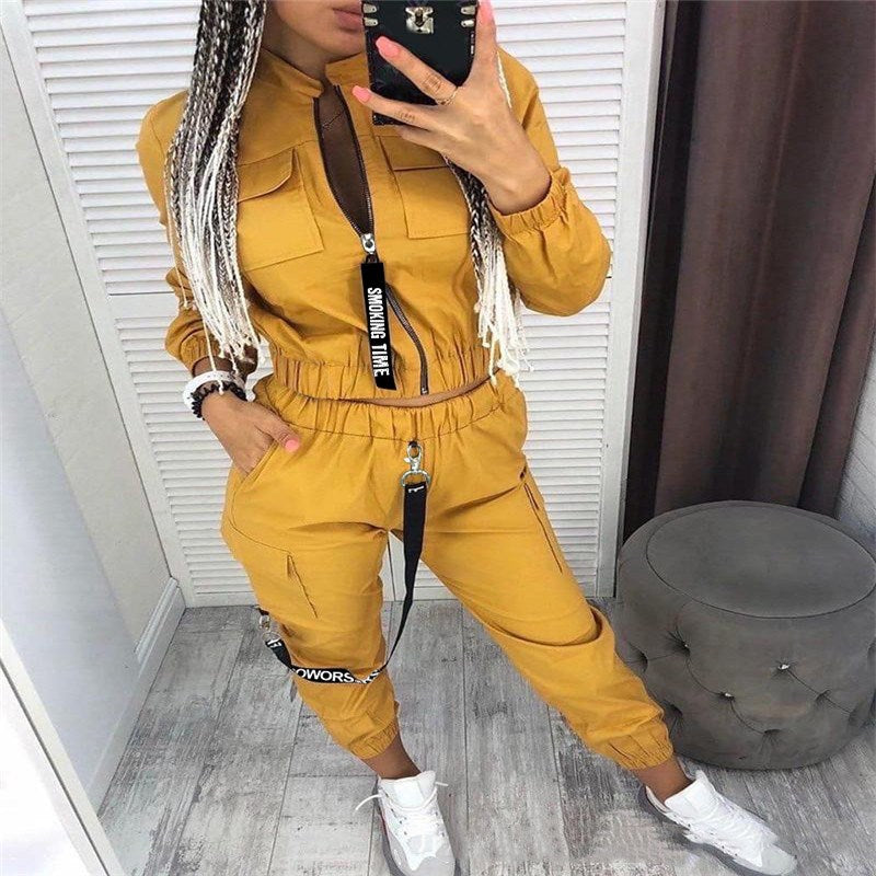 Mustard yellow zip-up jumpsuit set with cargo pockets and elastic cuffs, long sleeves